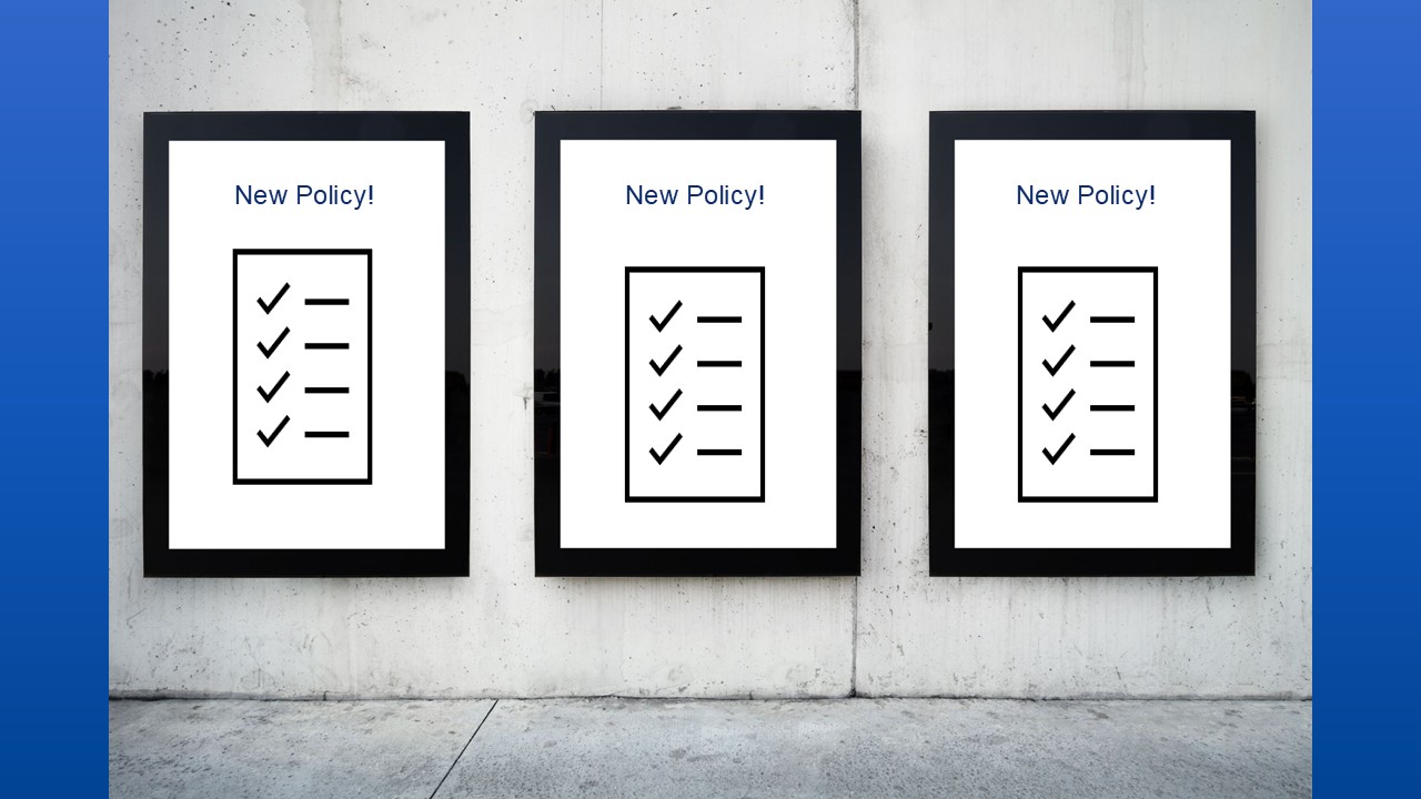 wall with posters announcing new policies